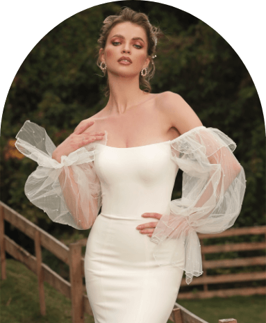 Model wearing a white gown by Chic Nostalgia