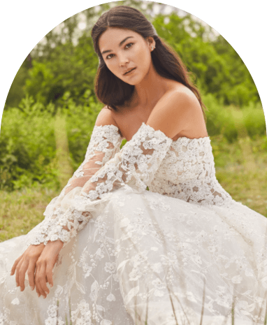 Model wearing a white gown by Martin Thornburg