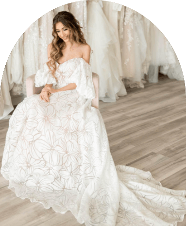 Model wearing a white gown