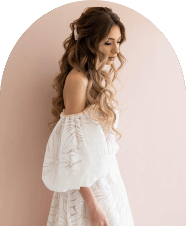 Model wearing a white gown