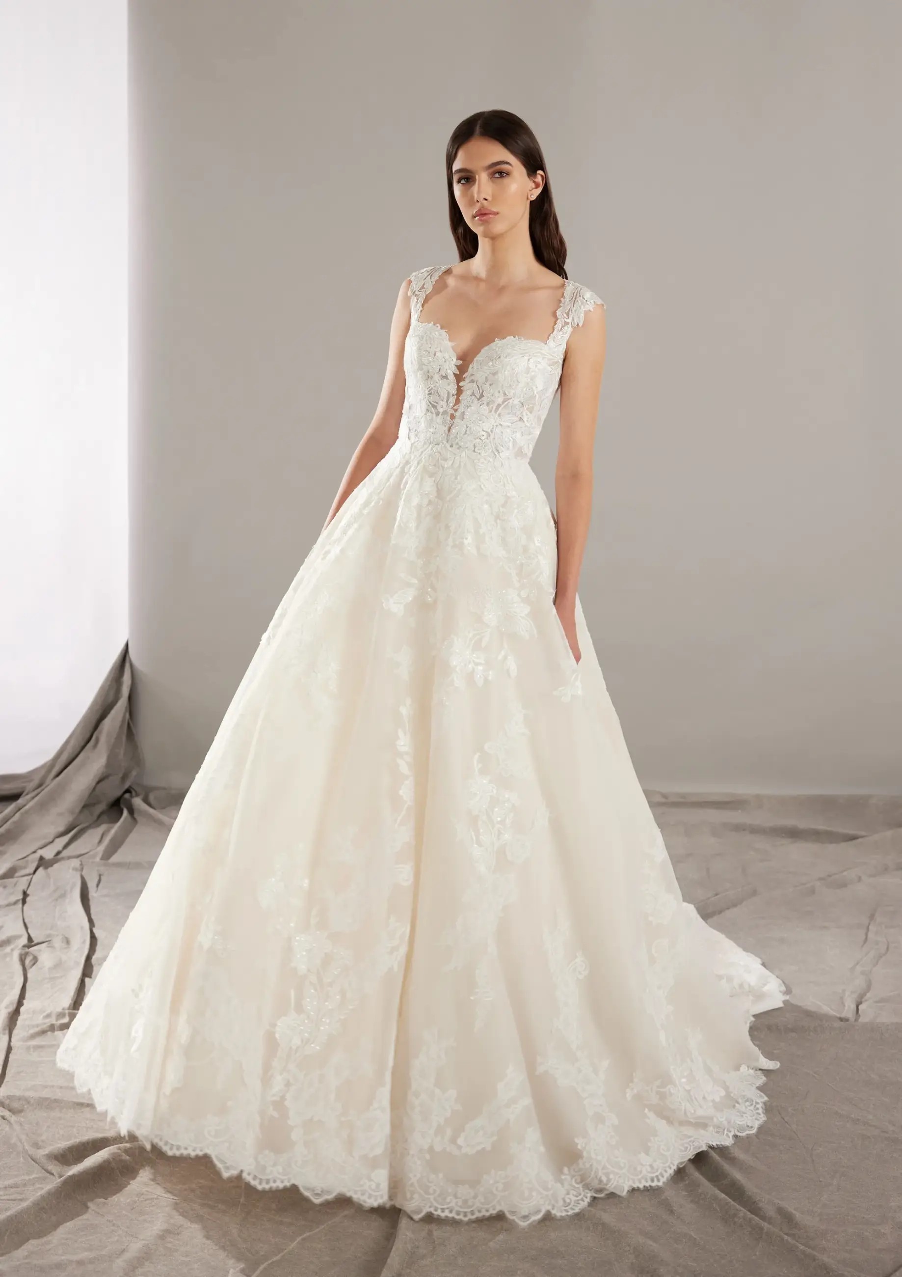 Lace, Satin, or Tulle? Choosing the Right Fabric for Your Dream Dress Image