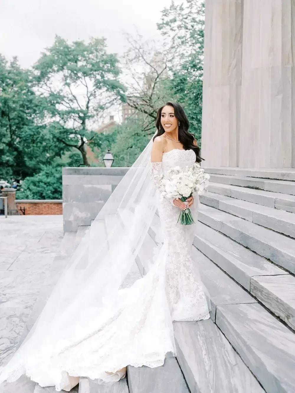 Model wearing a white gown