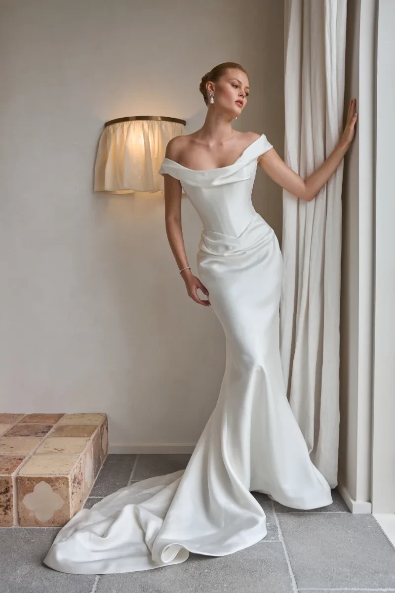 Model wearing a white gown by Steven Khalil